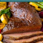 Smoked tri tip is coated in a homemade spice rub then slow smoked to tender and juicy perfection. #beef #dinneratthezoo