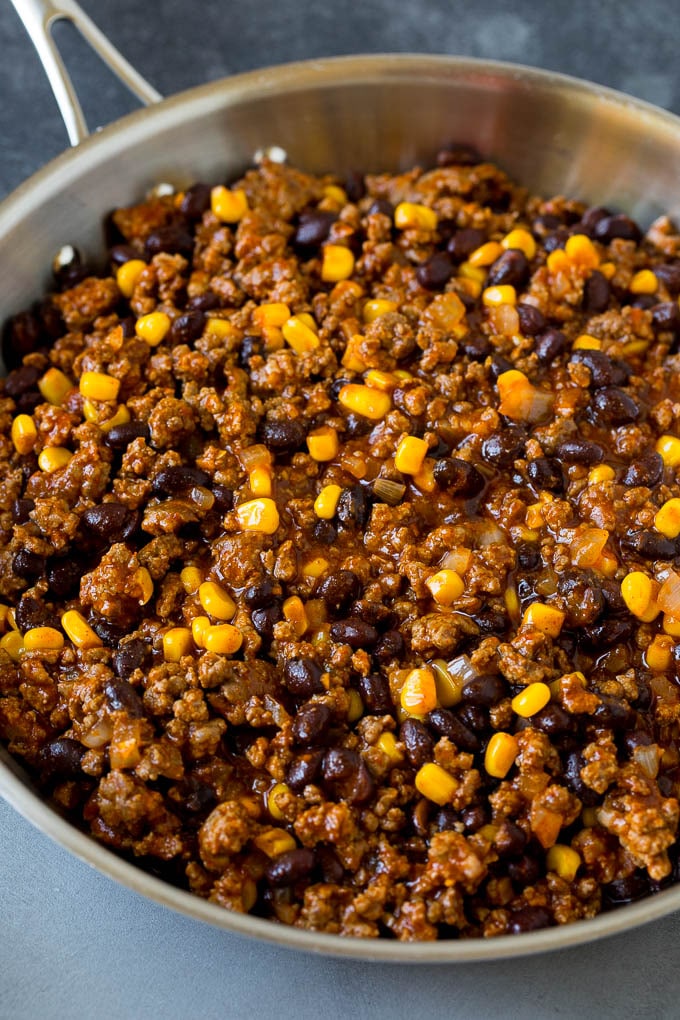 Ground beef, beans and corn in a skillet.