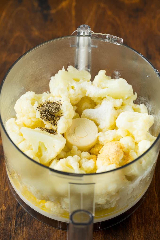 Cooked cauliflower, cream, butter and seasonings in a food processor.