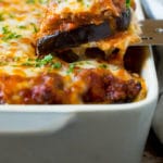 A spatula serving up a portion of eggplant lasagna.