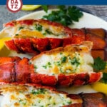 This recipe for grilled lobster tail is fresh lobster that's cooked to tender perfection, then topped with garlic and herb butter.