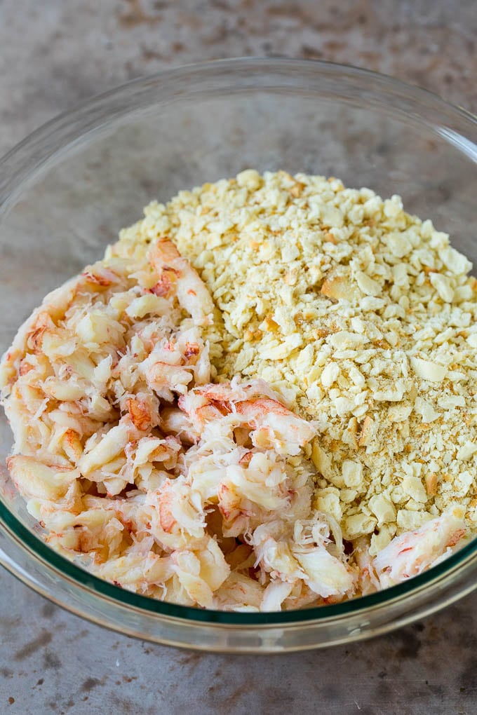 Crab meat and cracker crumbs in a bowl.