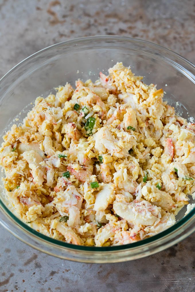 A mixture of crab, mayonnaise and seasonings in a bowl.