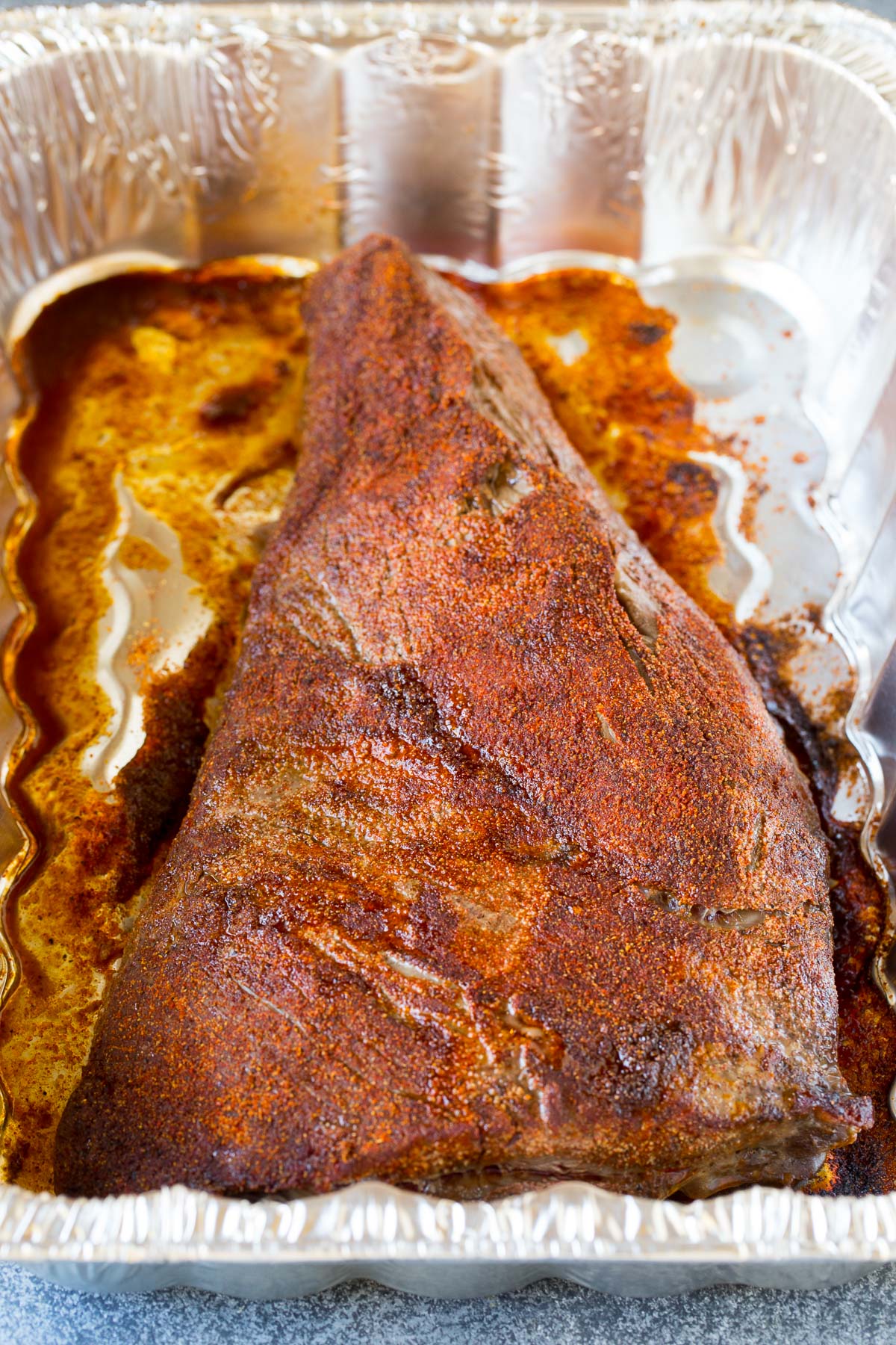 Tri tip broiled in a roasting pan.