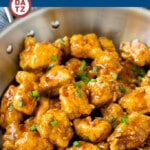 This honey chicken is crispy pieces of chicken breast that are fried to golden brown perfection, then tossed in a sweet and savory honey sauce.