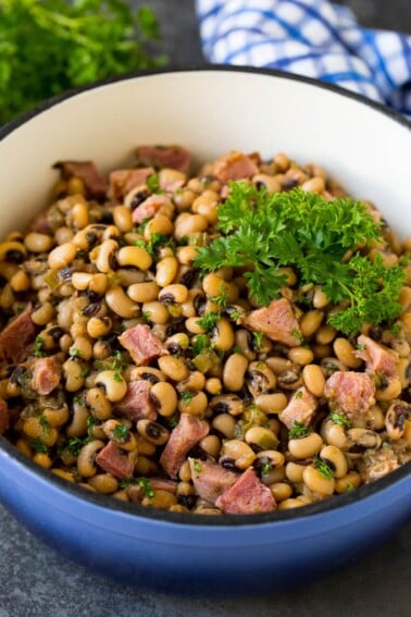 A pot of Hoppin' John made with stewed black eyed peas, ham and vegetables.