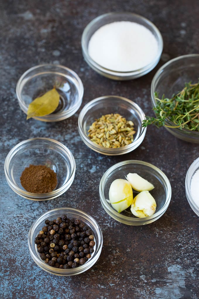 Bowls of spices, salt, sugar and herbs.