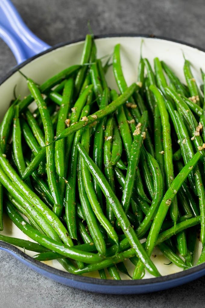 Cooked beans tossed with garlic and herbs.