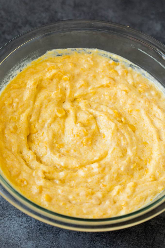 Batter for corn casserole in a mixing bowl.