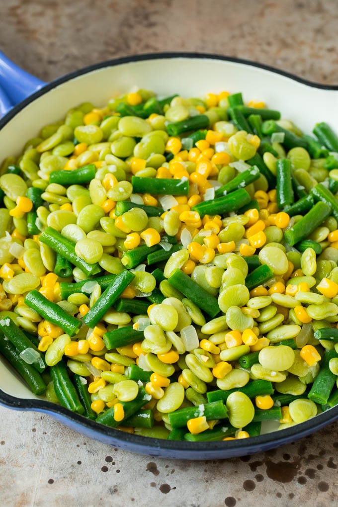 Corn, lima beans and green beans in a skillet.