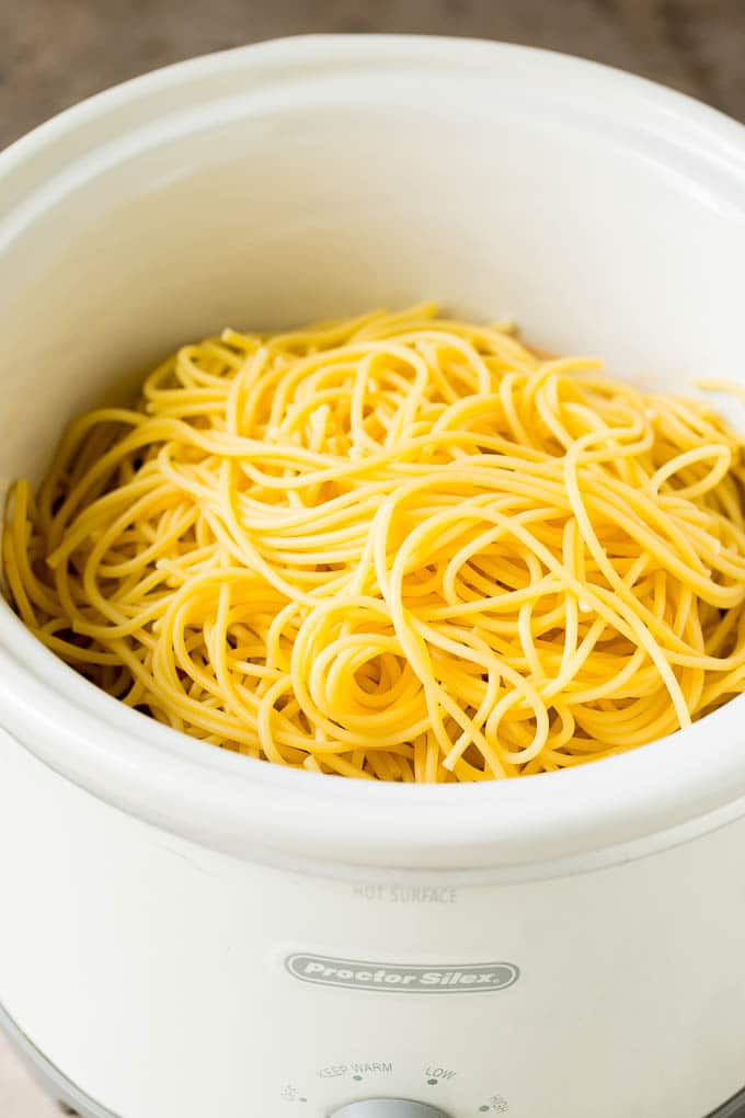 Cooked pasta inside a slow cooker.