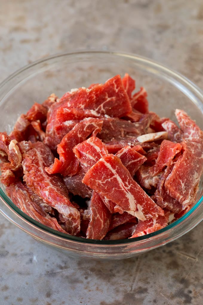 Thinly sliced flank steak coated in corn starch and seasonings.