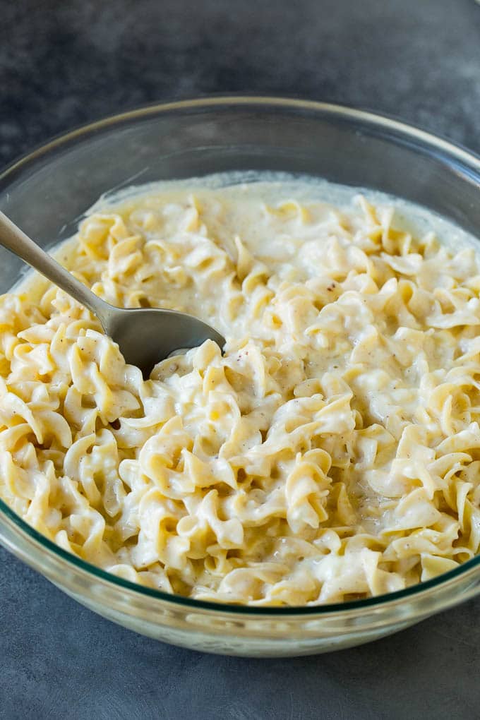 Noodles tossed in a creamy mixture of sour cream, cheeses and eggs.