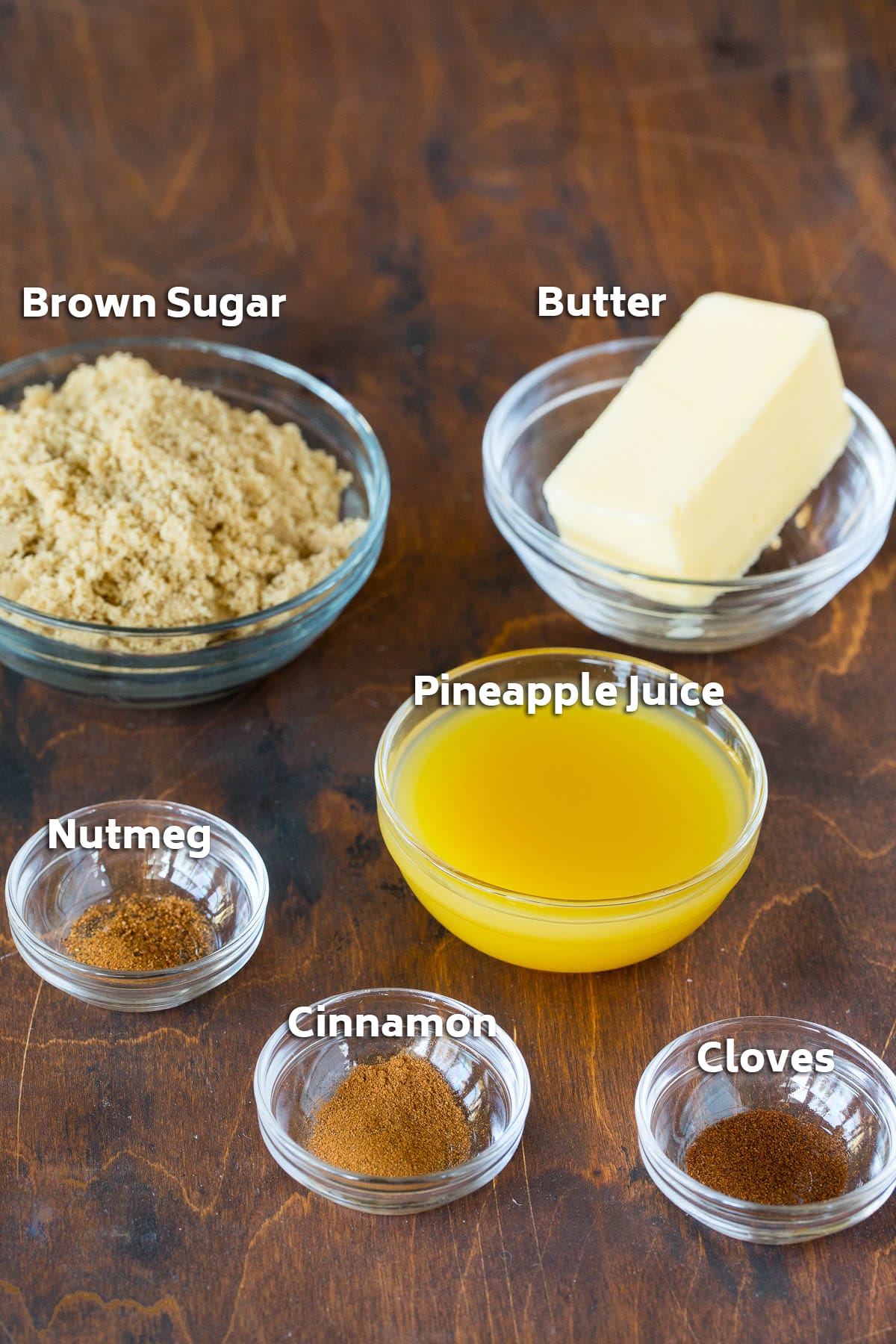 Bowls of ingredients including butter, sugar and seasonings.