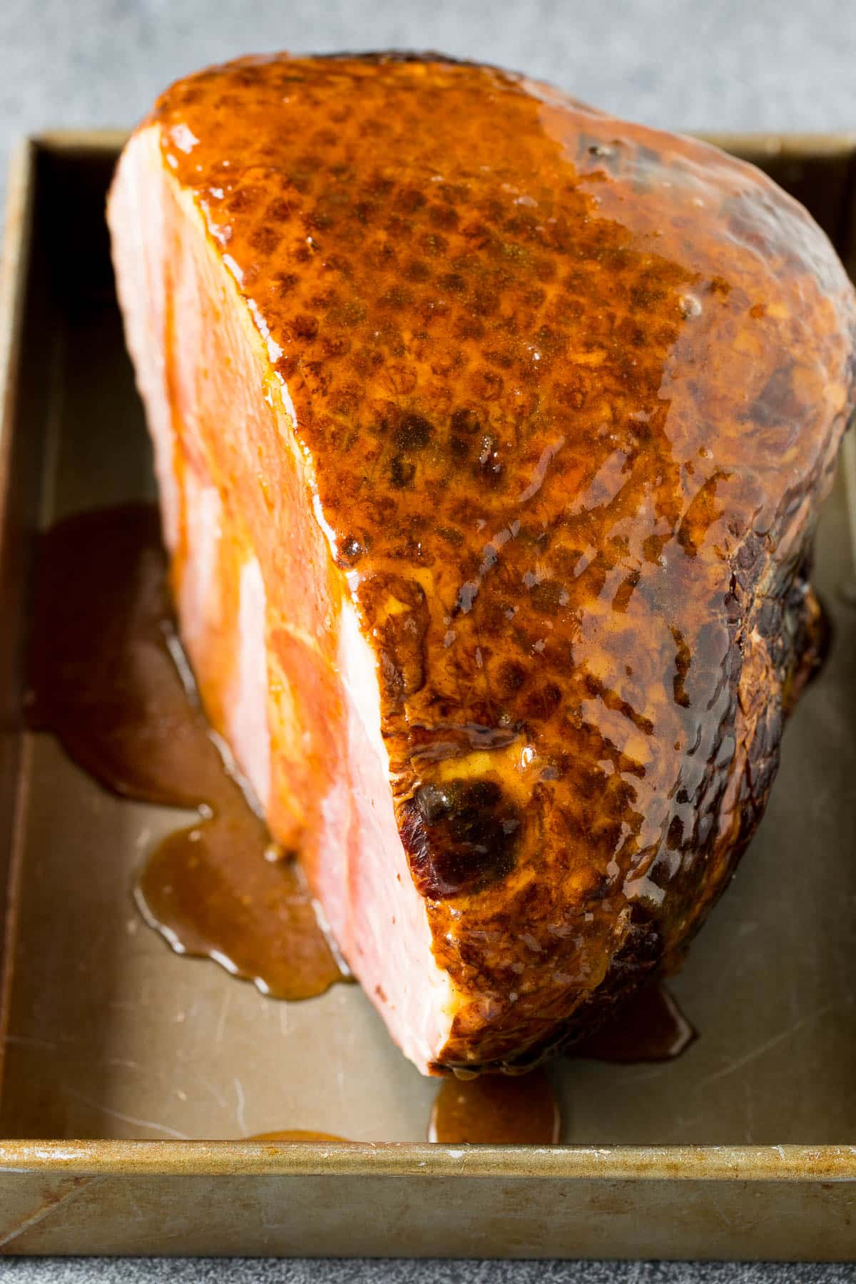 A ham coated in brown sugar glaze.