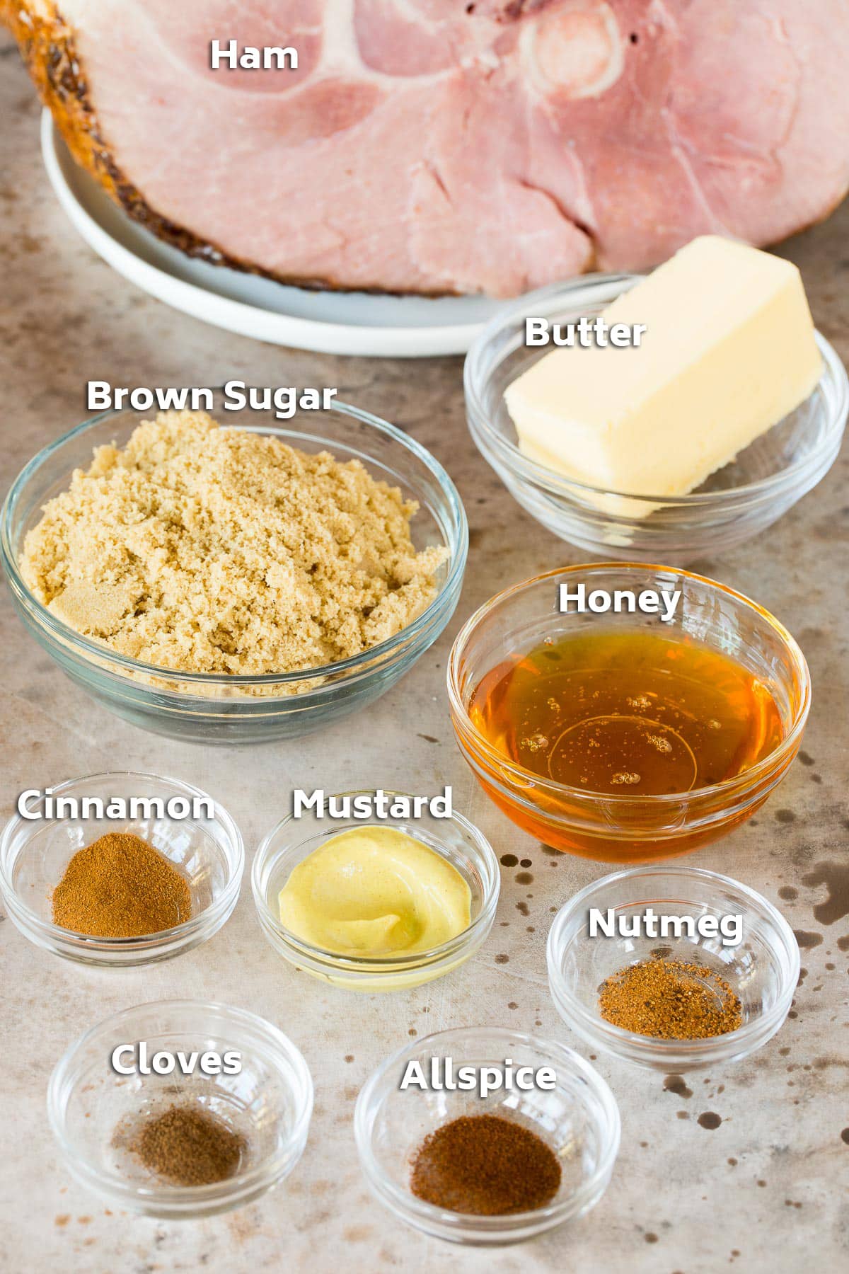 Ingredients including ham, brown sugar, honey, butter and seasonings.