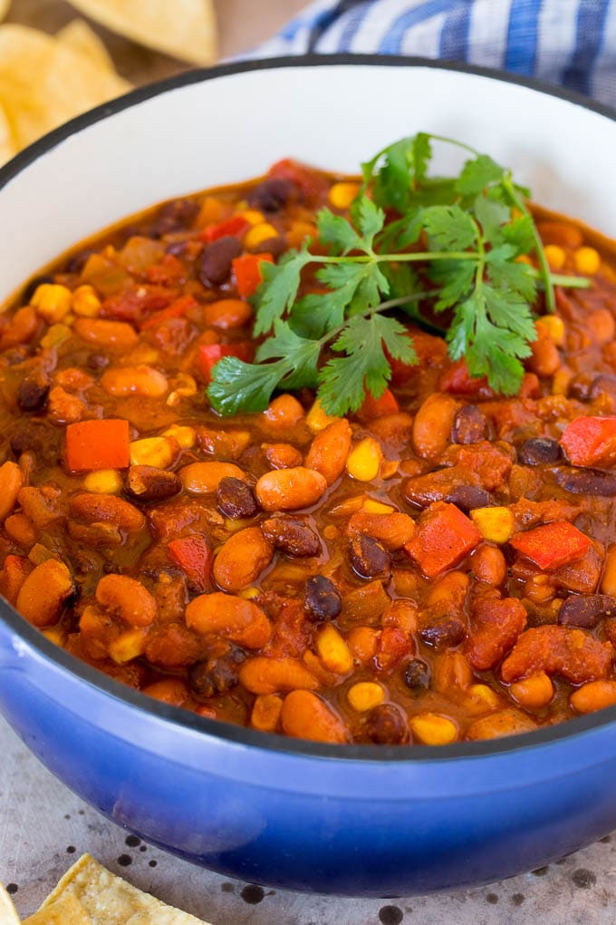 A pot of vegetarian chili topped with fresh cilantro.