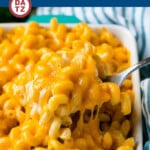 This baked mac and cheese is a blend of tender noodles in a rich and creamy cheese sauce, topped off with more cheese and baked to perfection.