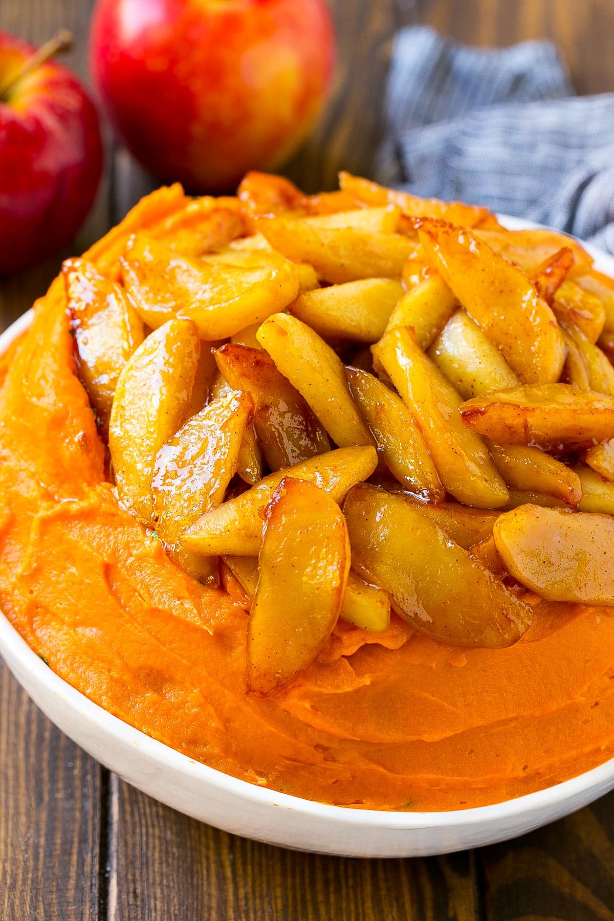 Mashed yams topped with cooked apples.