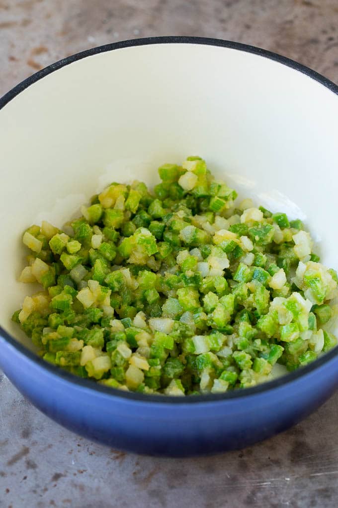 Diced onion, celery and peppers coated in roux.