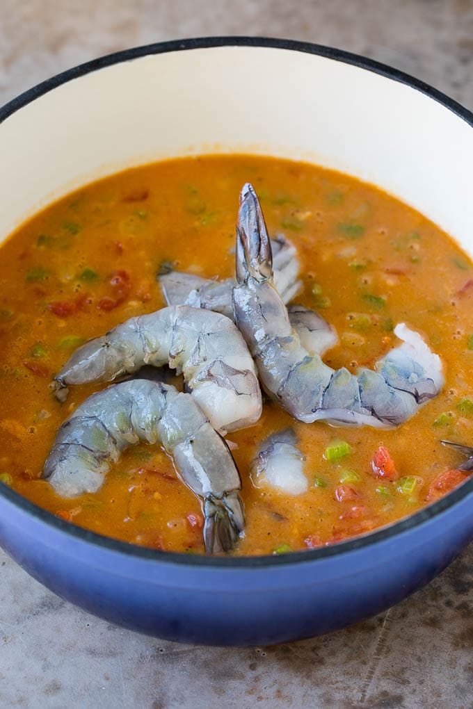 Raw shrimp in a homemade seafood sauce.