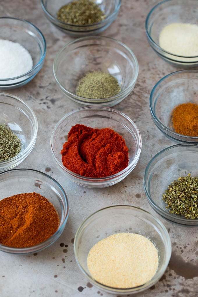 Small bowls of herbs and spices.