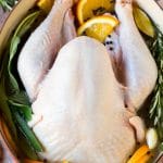 How to brine a turkey with a raw turkey in a pot of brine.