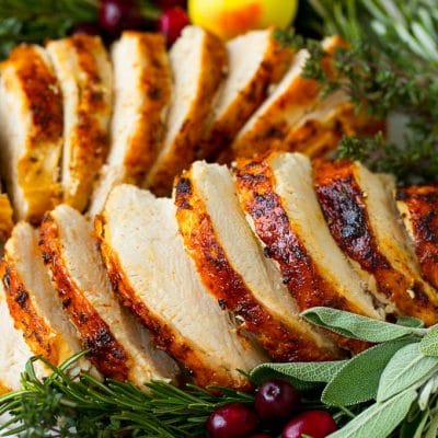 Cooked Instant Pot turkey breast sliced and served on a platter.