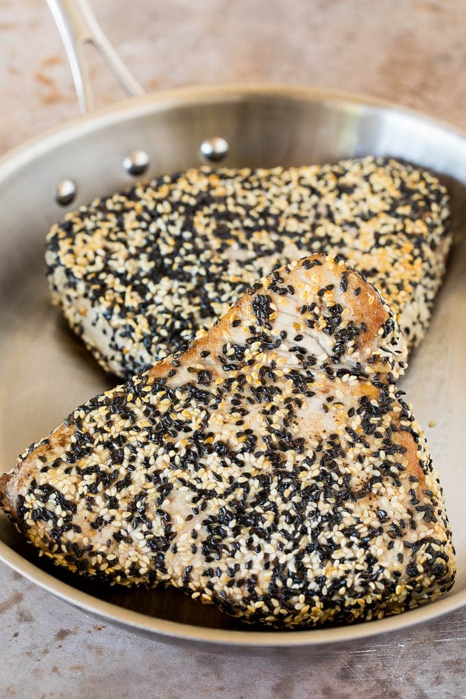 Sesame crusted tuna in a pan.