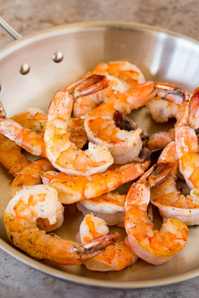 Cooked shrimp in a pan.