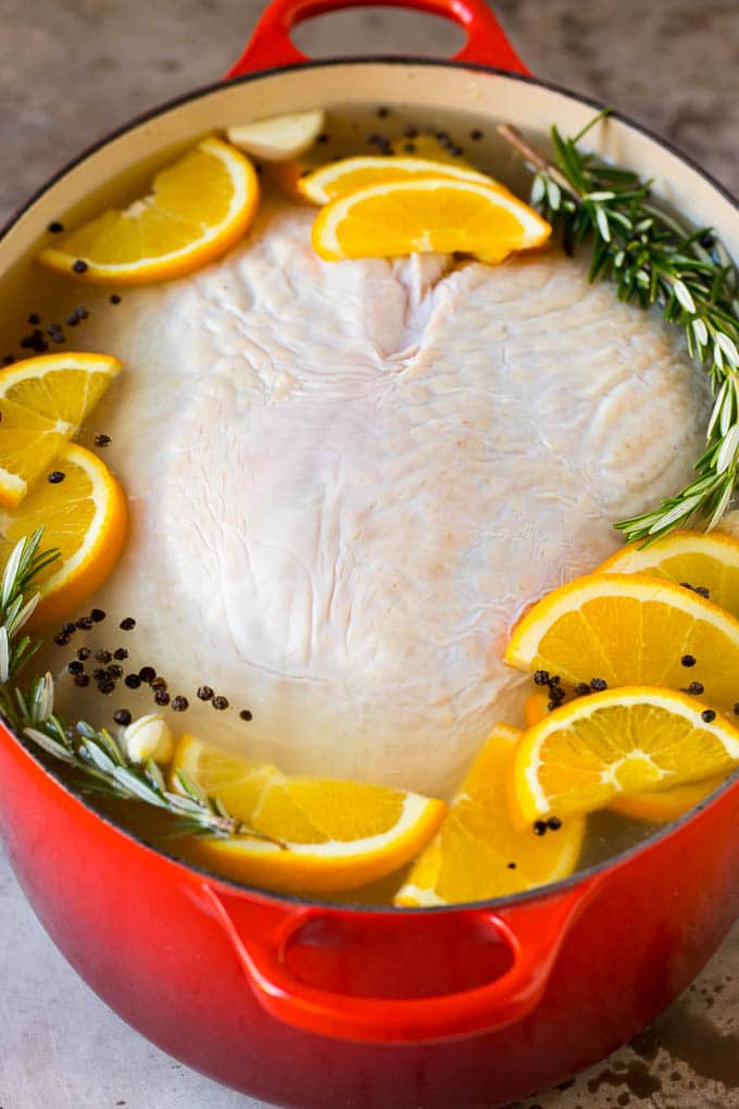 A raw breast in a pot of brine.