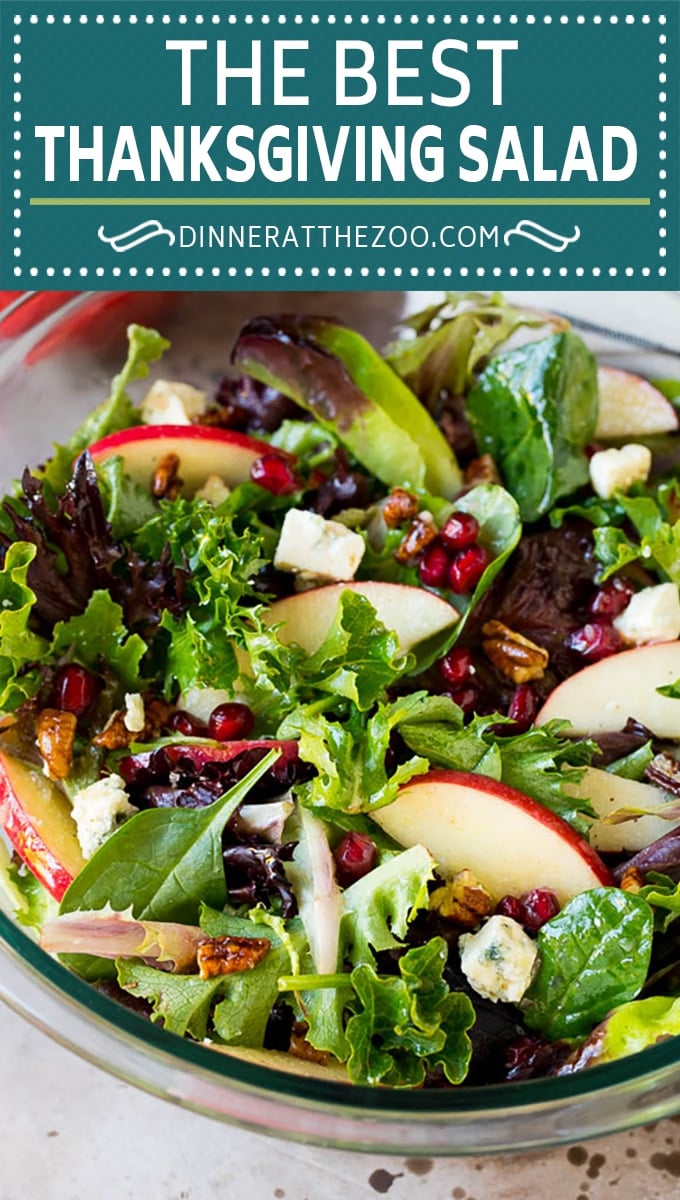 This Thanksgiving salad is a blend of mixed greens, fresh apples, pomegranate seeds, blue cheese and candied pecans, all tossed in a homemade vinaigrette.