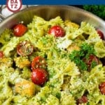 This chicken pesto pasta is sauteed chicken, farfalle pasta and cherry tomatoes, all tossed in basil pesto and finished off with parmesan cheese.