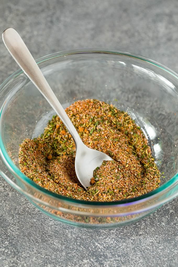 A spoon in a bowl of spice mix.