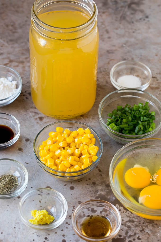 Soup ingredients in small clear bowls.