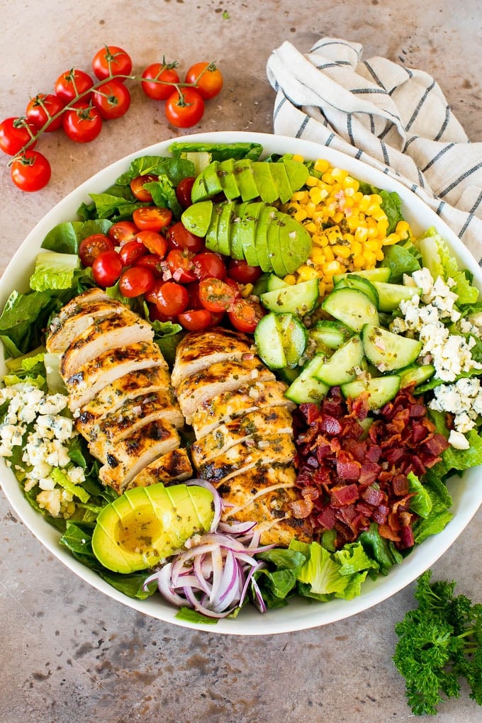 Grilled chicken salad with bacon, veggies and blue cheese.