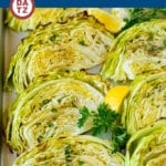 This roasted cabbage recipe is wedges of cabbage seasoned with olive oil and spices, then oven baked until tender and browned.