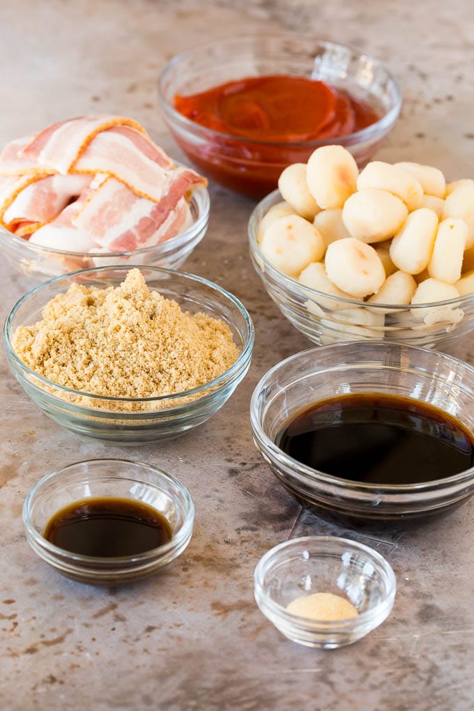 Bowls of water chestnuts, brown sugar, seasonings and bacon.