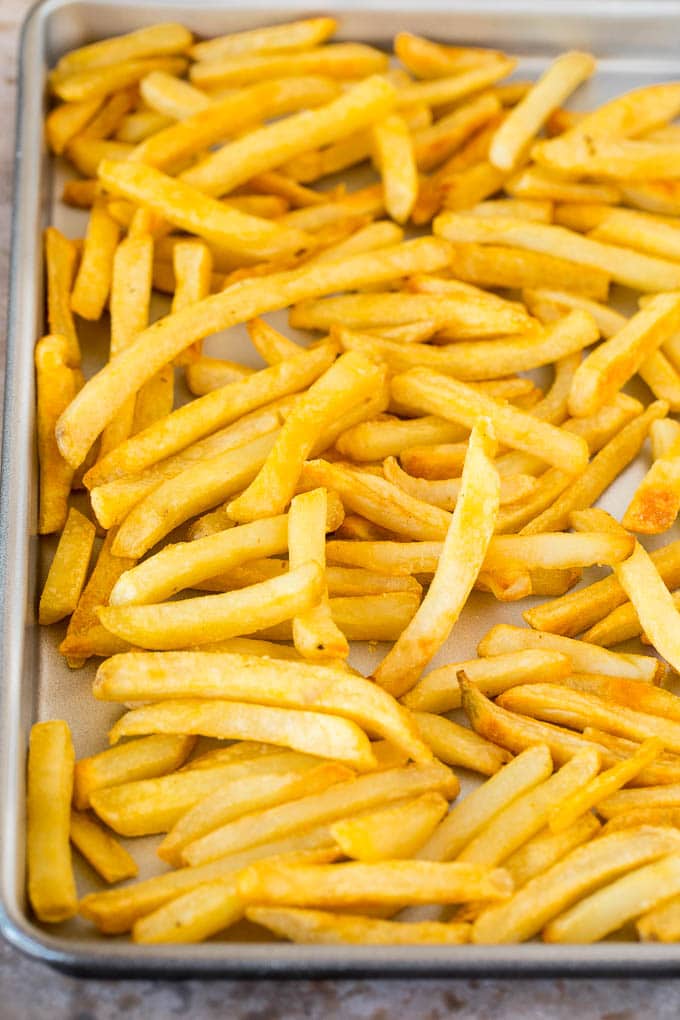 French fries on a sheet pan.