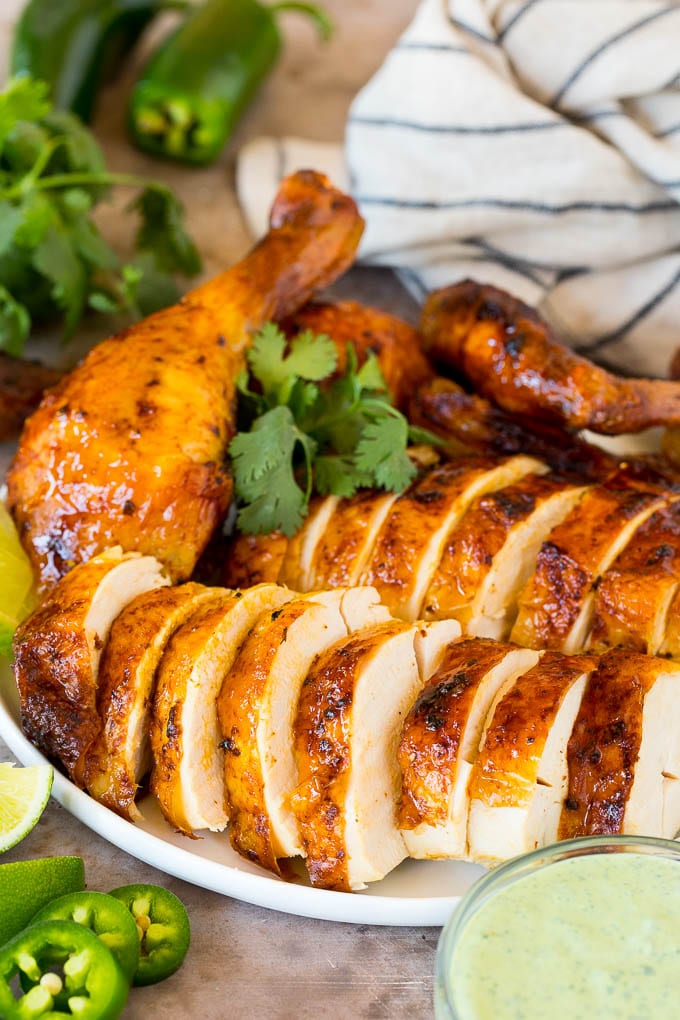 Sliced Peruvian chicken with lime, cilantro and a creamy sauce.