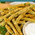 These green bean fries are fresh green beans coated in seasoned breadcrumbs and parmesan cheese, then baked to golden brown perfection.