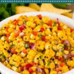 This corn salsa is fresh corn kernels combined with lime juice, cilantro, red onion and two types of peppers to make a light and refreshing dip.