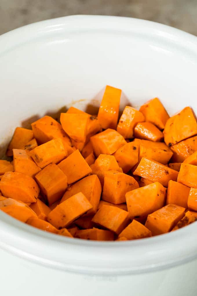 Diced yams in a slow cooker.