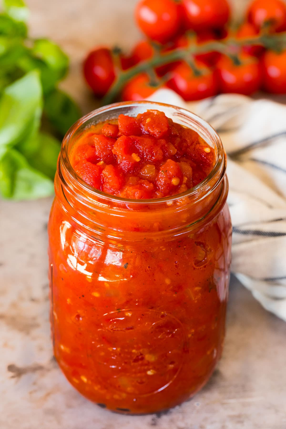 A jar of homemade marinara sauce.