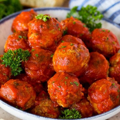 A bowl of Italian meatballs in tomato sauce.