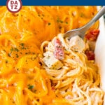 This chicken spaghetti is a baked pasta dish with diced chicken and zesty tomatoes in a creamy cheese sauce.