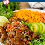 This Mexican style carne guisada is beef that is stewed with tomatoes, peppers and spices until it becomes tender and flavorful.