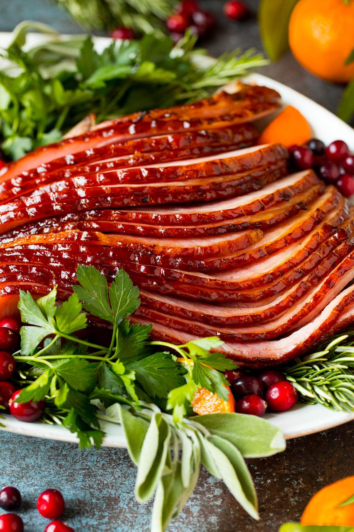 Sliced spiral ham on a serving plate.