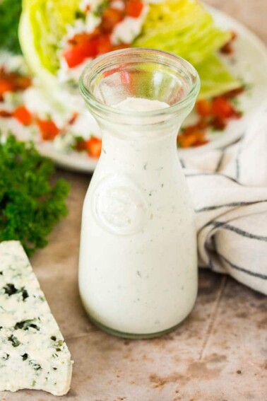 A jar of blue cheese dressing.