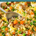 This pork fried rice is pork tenderloin pieces cooked with vegetables, eggs and rice in a savory sauce.